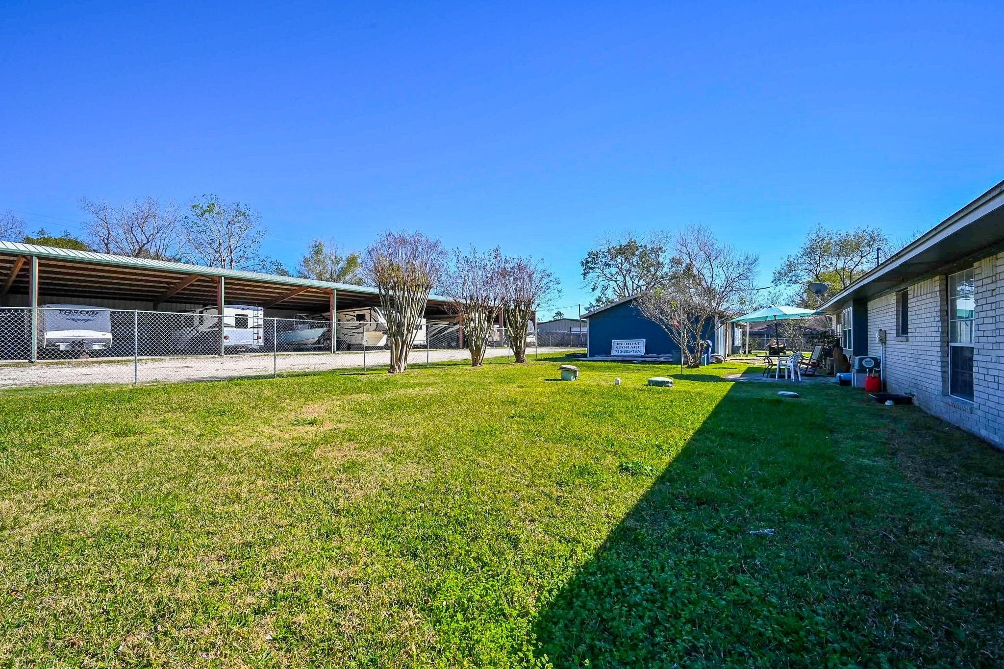 18910 Carrot Street Spring, TX 77379 - Photo 23 of 48 a view of a house with a big yard