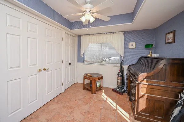 a large kitchen with stainless steel appliances granite countertop a stove a sink and a refrigerator