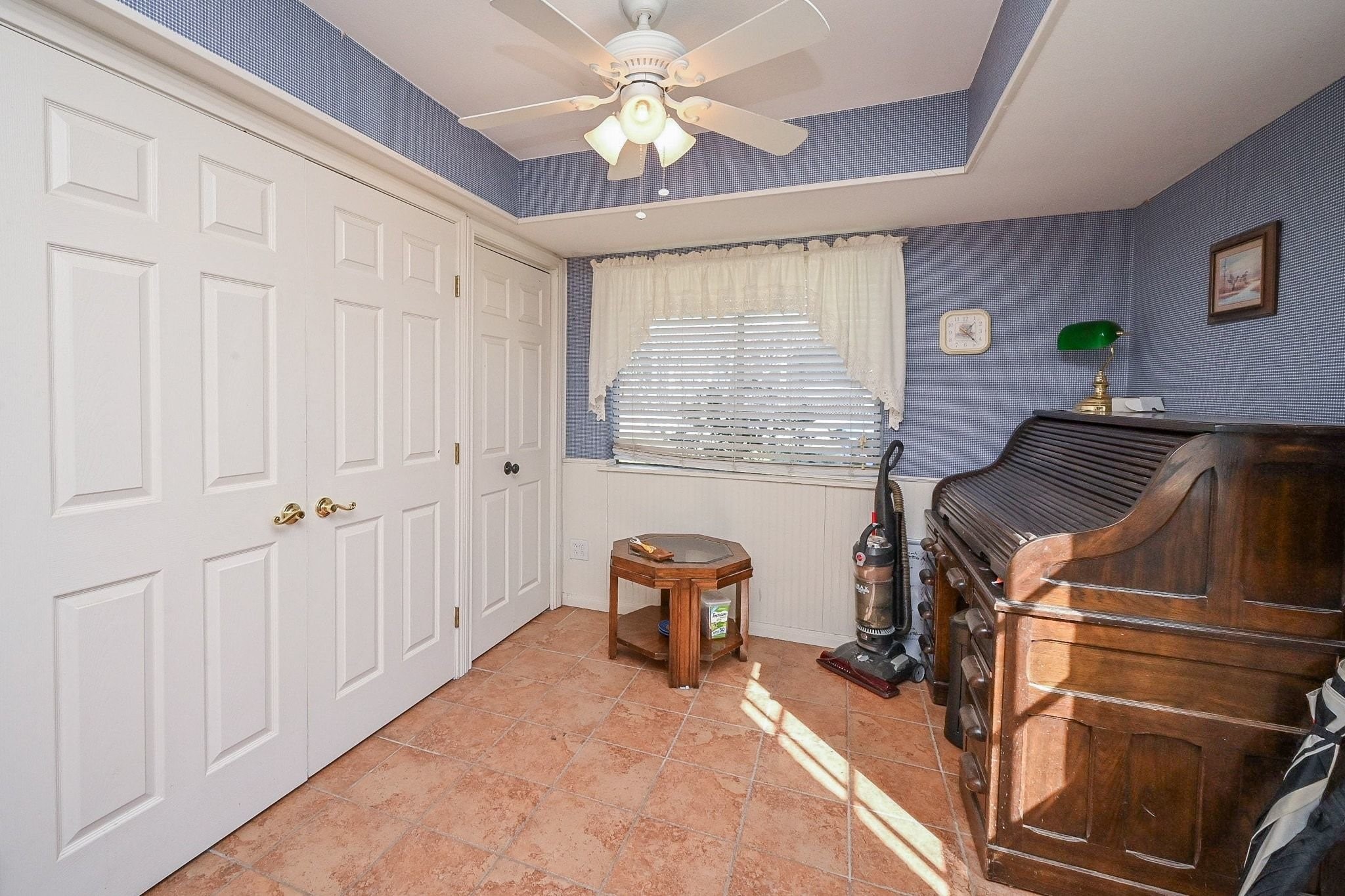 18910 Carrot Street Spring, TX 77379 - Photo 44 of 48 a view of a workspace with furniture and a window