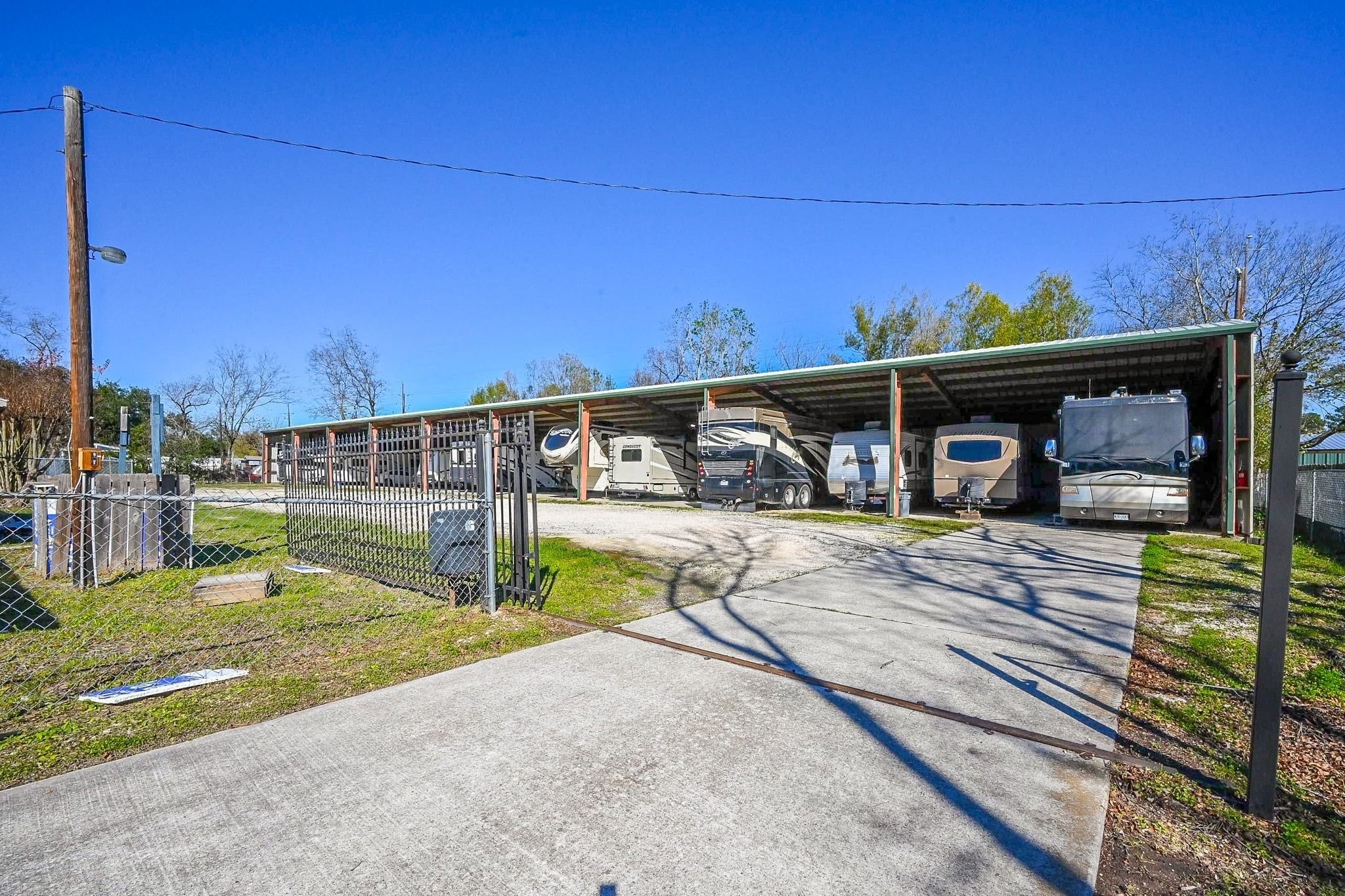 18910 Carrot Street Spring, TX 77379 - Photo 8 of 48 a view of a swimming pool with an outdoor seating