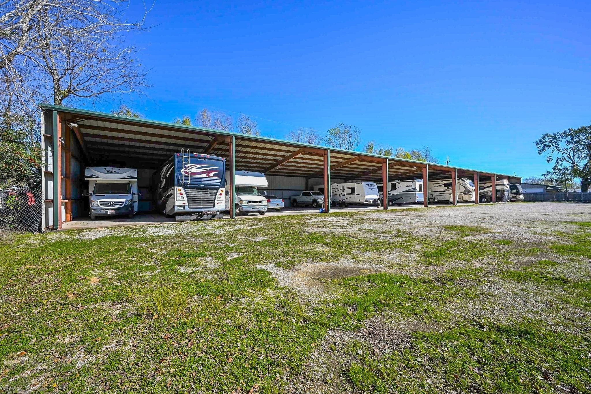 18910 Carrot Street Spring, TX 77379 - Photo 9 of 48 a view of a house with a yard and sitting area