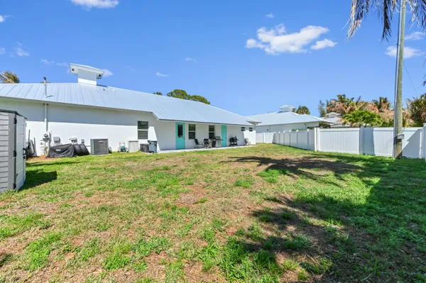 a house view with a swimming pool