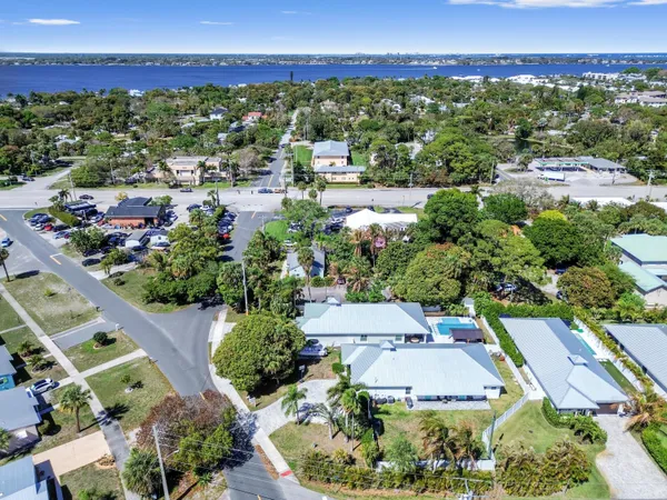 an aerial view of a house with a garden