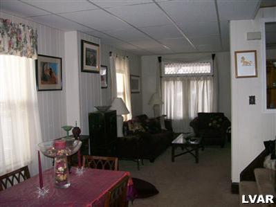 835 Spring Street Bethlehem, PA 18018 - Photo 5 of 12 a living room with furniture and wooden floor