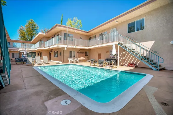 a view of house with yard