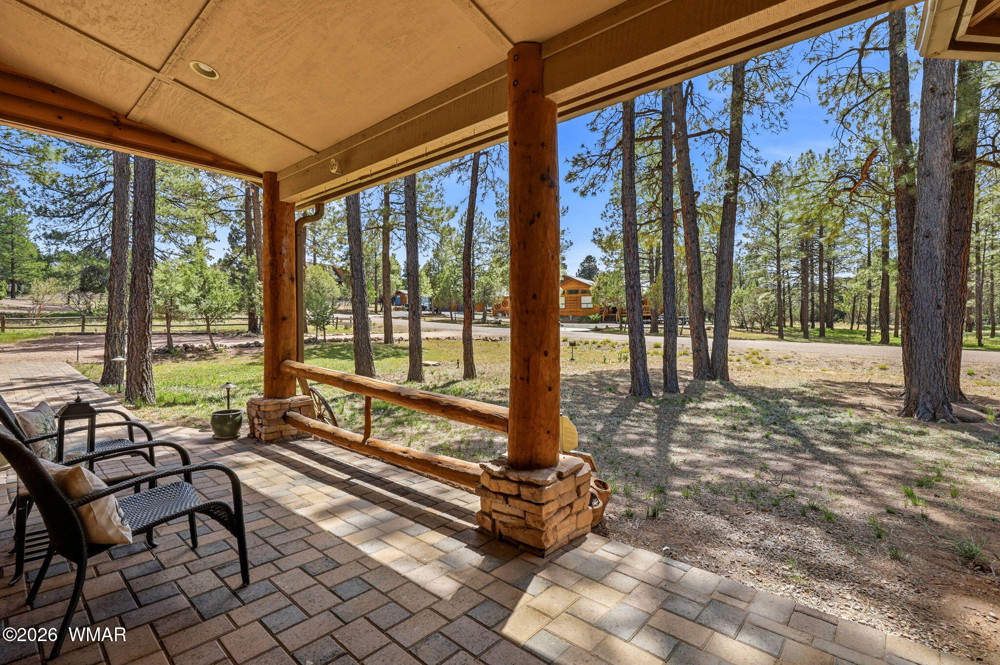 2236 Roundabout Way Overgaard, AZ 85933 - Photo 3 of 45 a living room with furniture and a floor to ceiling window