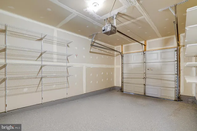 a view of a room with storage and racks on the wall