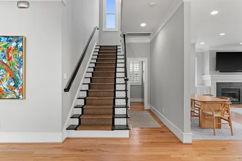a view of entryway with wooden floor