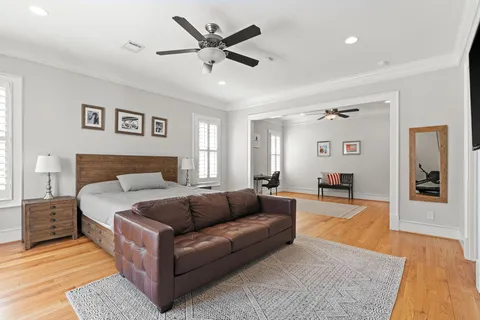 a living room with furniture and a rug