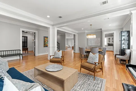a living room with furniture and a table