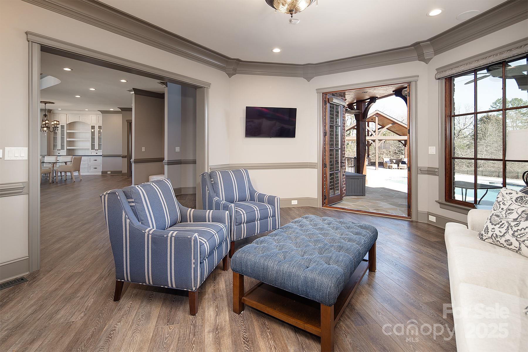 3200 Beaty Road Gastonia, NC 28056 - Photo 12 of 43 a living room with furniture and a flat screen tv