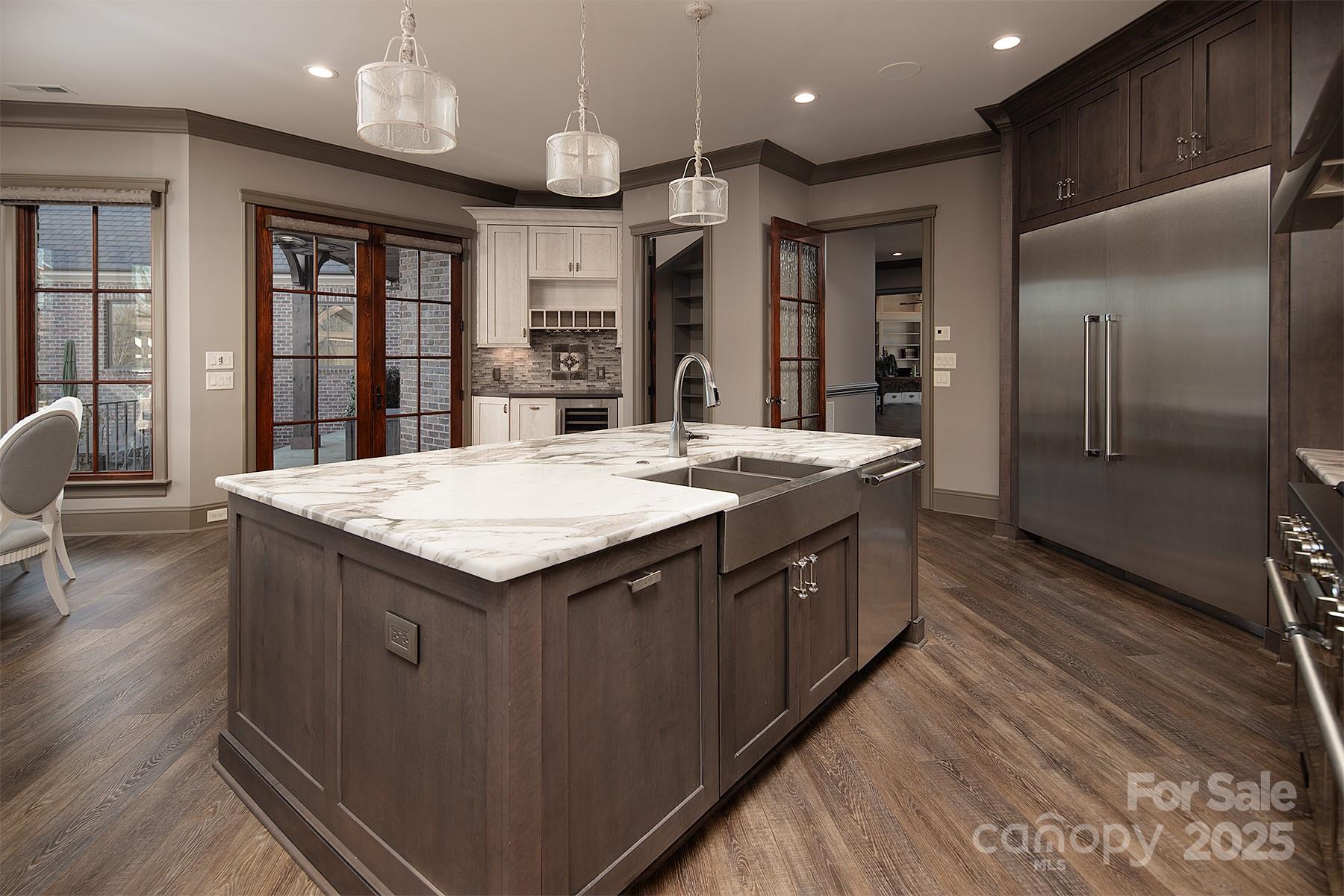 3200 Beaty Road Gastonia, NC 28056 - Photo 15 of 43 a kitchen with stainless steel appliances granite countertop a kitchen island a stove a refrigerator and a sink