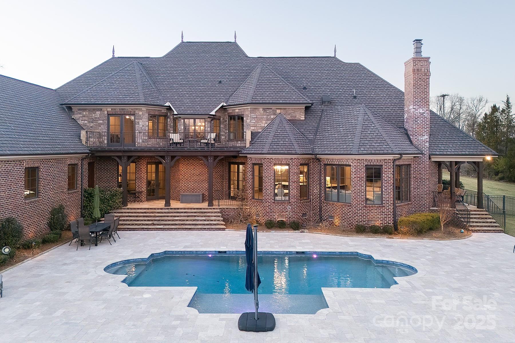 3200 Beaty Road Gastonia, NC 28056 - Photo 2 of 43 a front view of a house with swimming pool