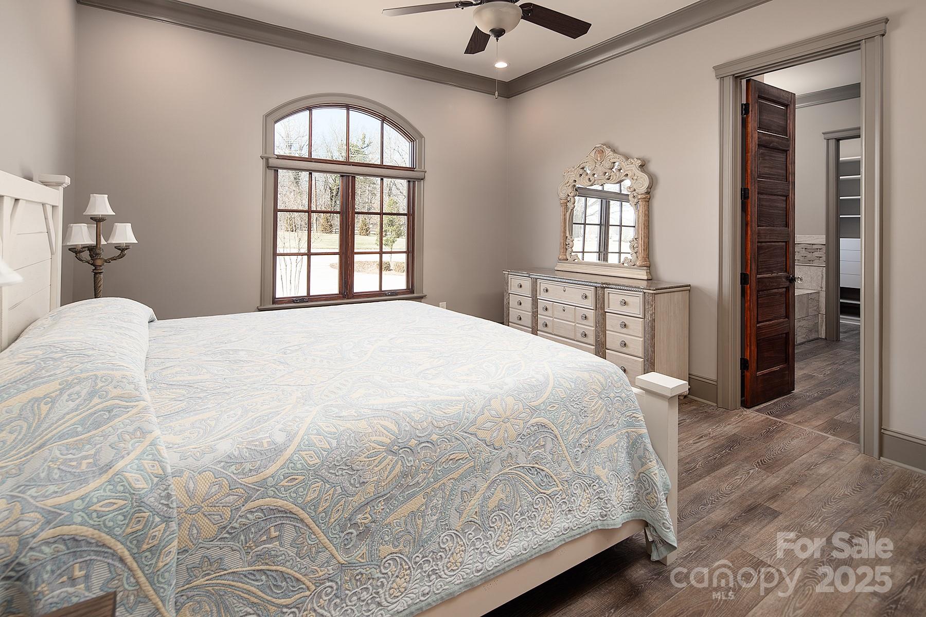 3200 Beaty Road Gastonia, NC 28056 - Photo 25 of 43 a spacious bedroom with a bed mirror and window