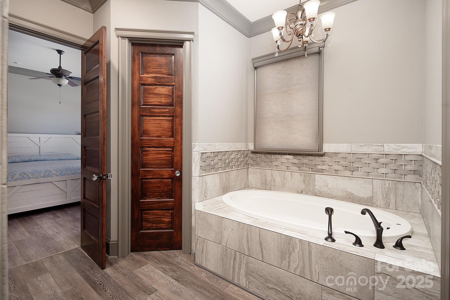 3200 Beaty Road Gastonia, NC 28056 - Photo 26 of 43 a bathroom with a bathtub and a sink