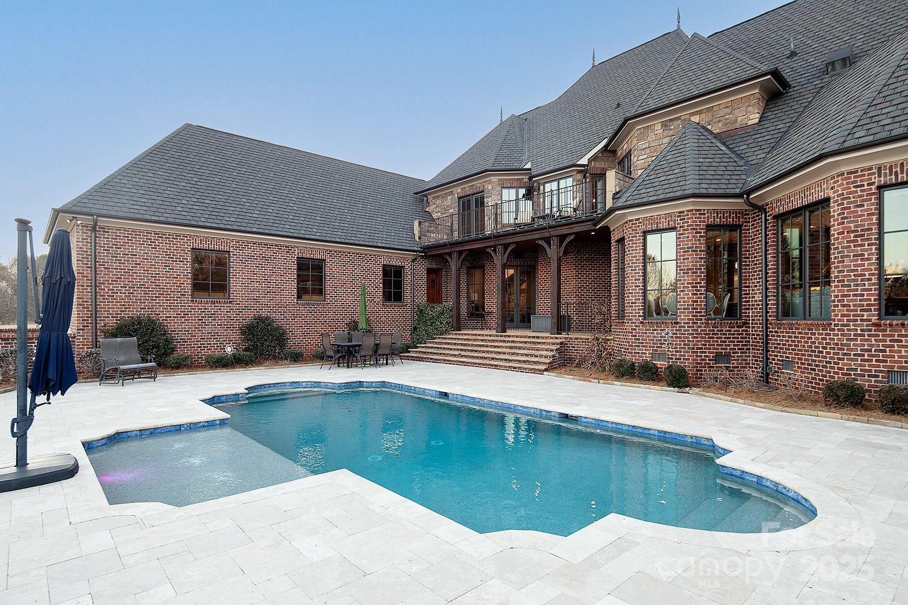 3200 Beaty Road Gastonia, NC 28056 - Photo 36 of 43 a view of a house with swimming pool