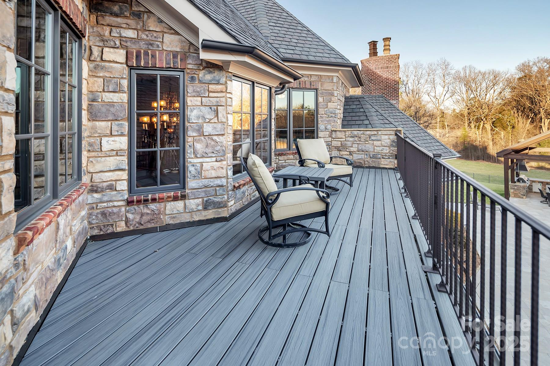 3200 Beaty Road Gastonia, NC 28056 - Photo 40 of 43 a balcony with wooden floor table and chairs