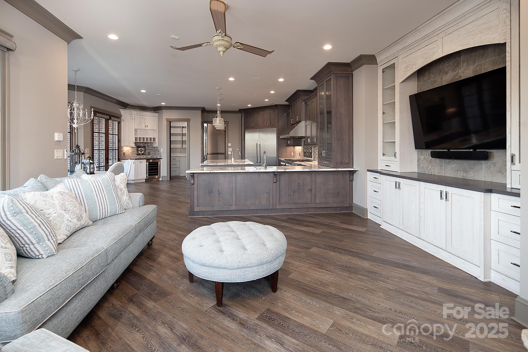3200 Beaty Road Gastonia, NC 28056 - Photo 5 of 43 a living room with stainless steel appliances furniture and a flat screen tv