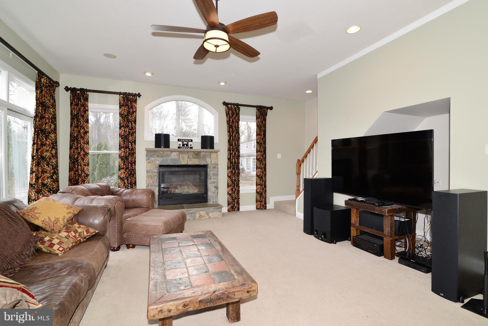 1763 Proffit Road Vienna, VA 22182 - Photo 13 of 30 a living room with furniture and a flat screen tv