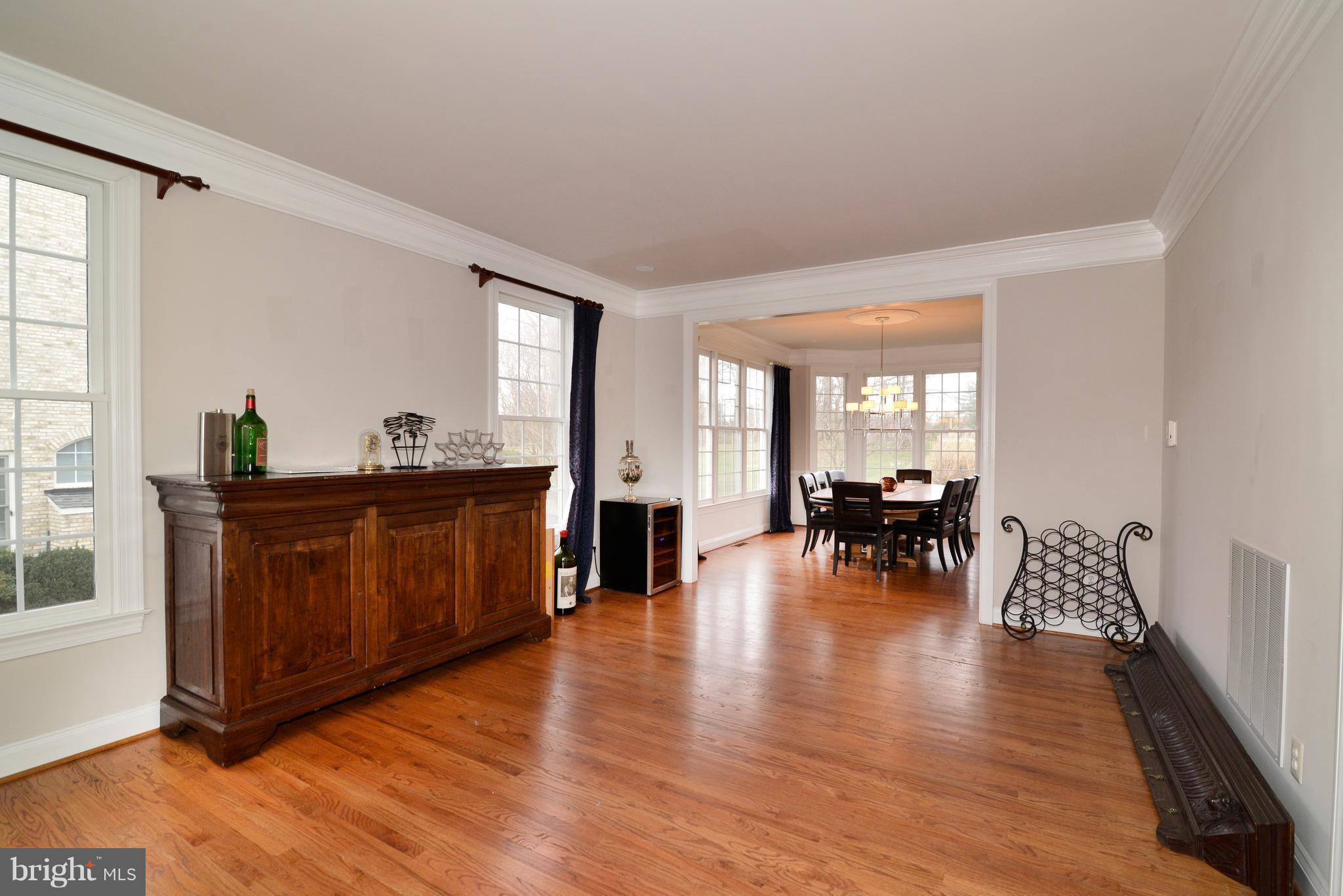 1763 Proffit Road Vienna, VA 22182 - Photo 15 of 30 a view of dining room with furniture and wooden floor