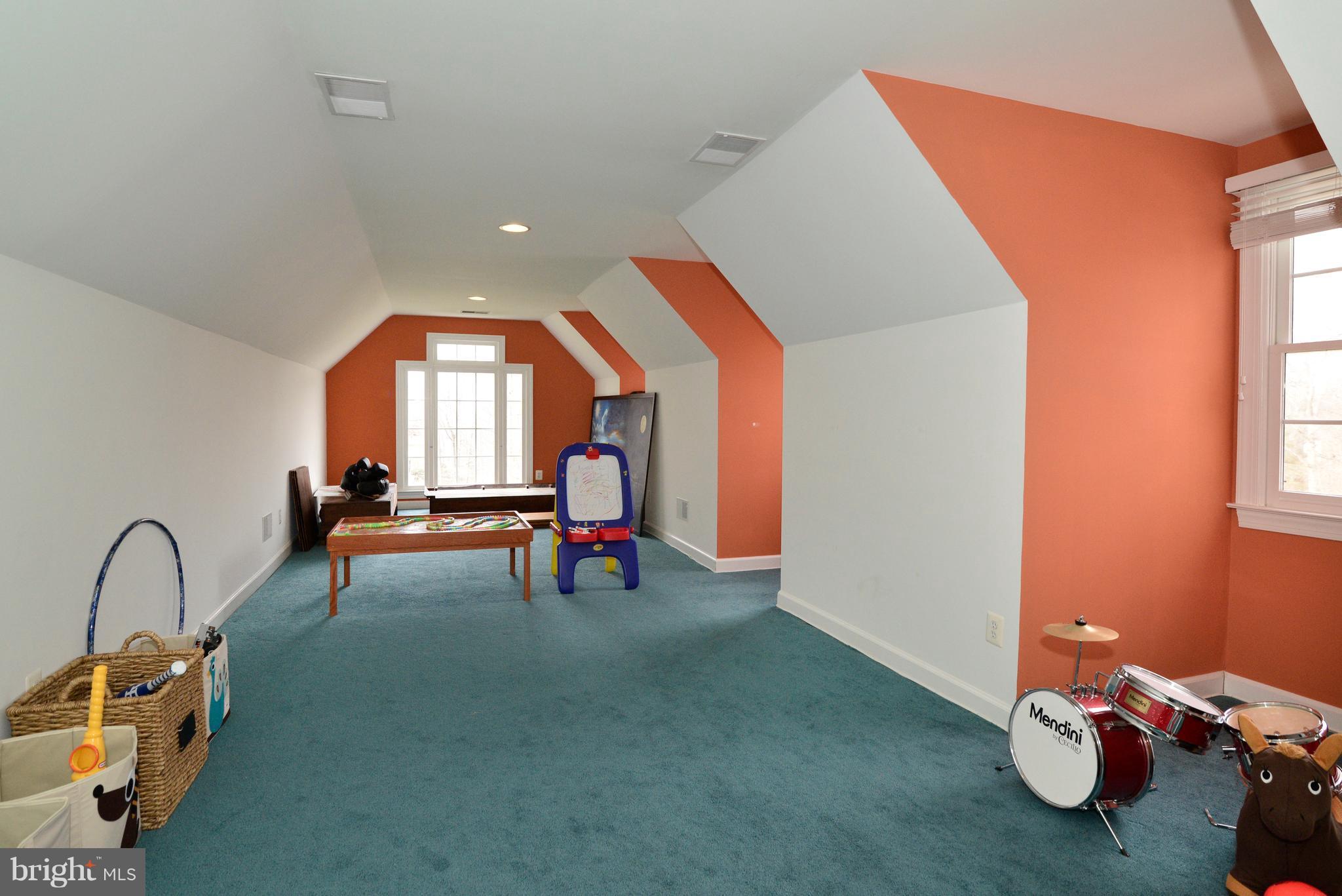 1763 Proffit Road Vienna, VA 22182 - Photo 16 of 30 a view of a room with chairs and toys