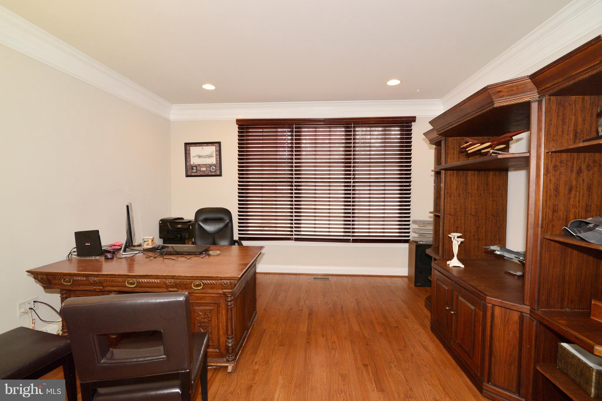 1763 Proffit Road Vienna, VA 22182 - Photo 19 of 30 a view of a kitchen with a sink and wooden floor