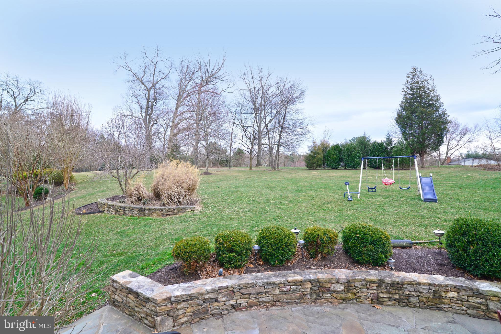1763 Proffit Road Vienna, VA 22182 - Photo 29 of 30 a view of a garden with a slide