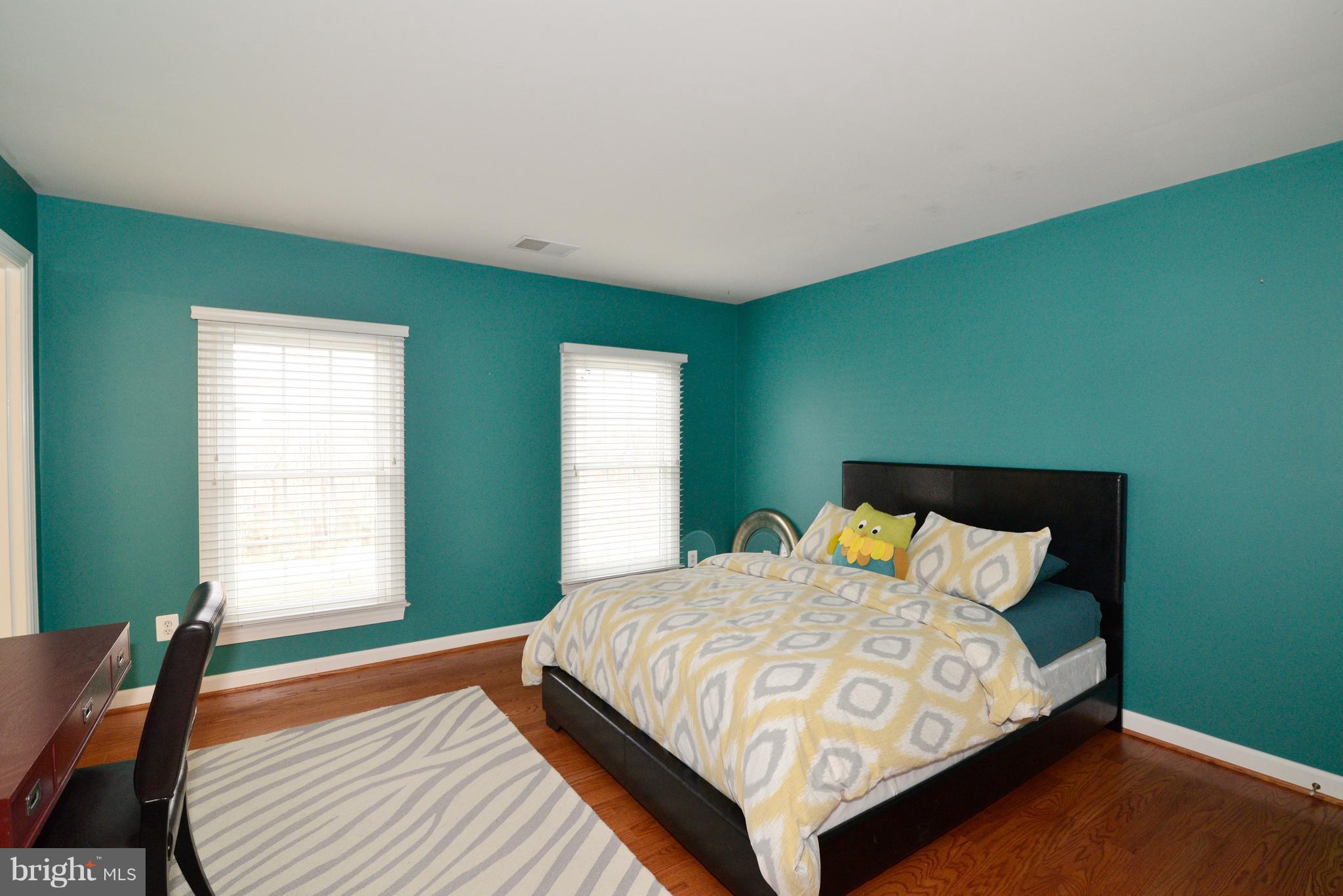 1763 Proffit Road Vienna, VA 22182 - Photo 6 of 30 a bedroom with a bed and window