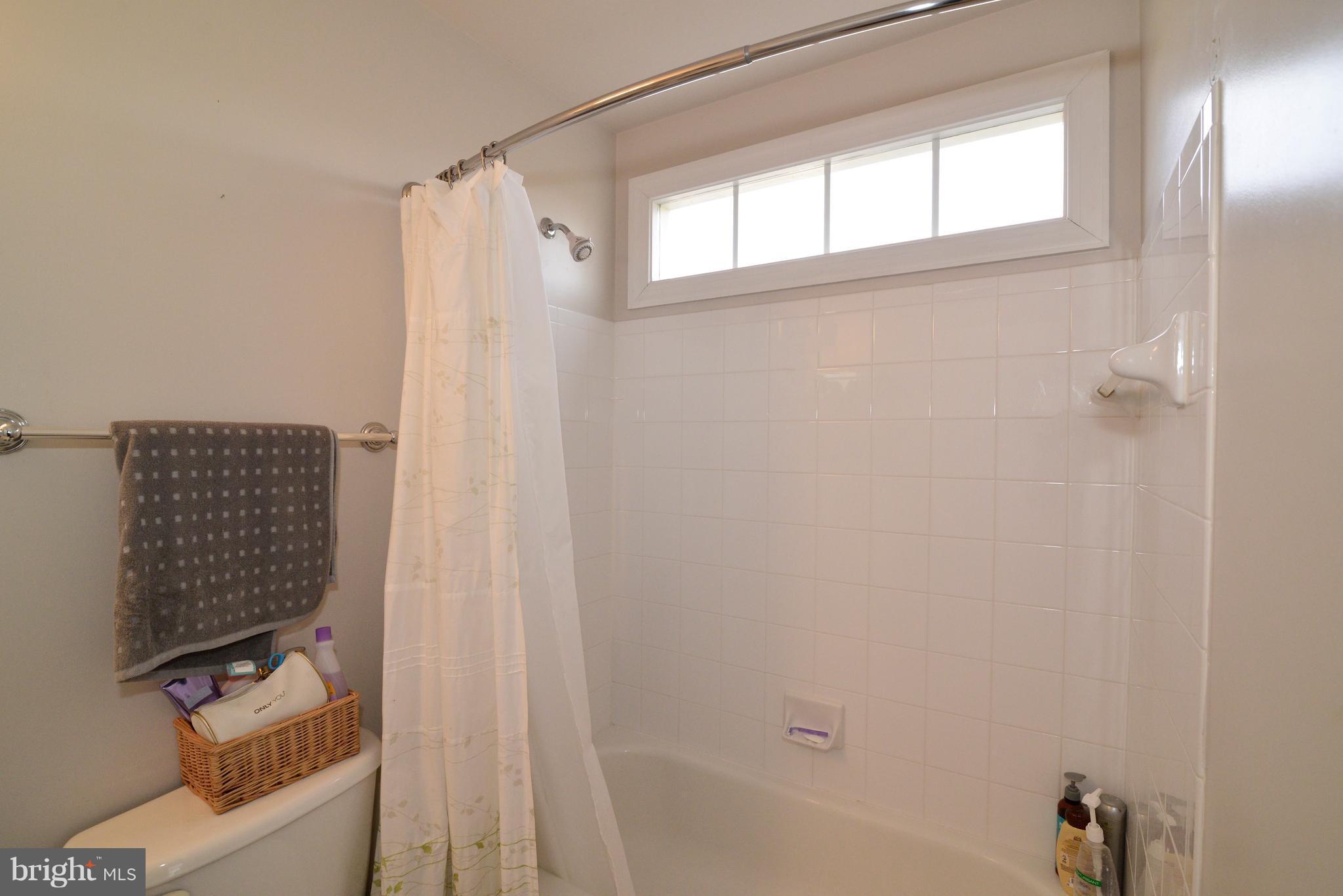 1763 Proffit Road Vienna, VA 22182 - Photo 7 of 30 a bathroom with a shower