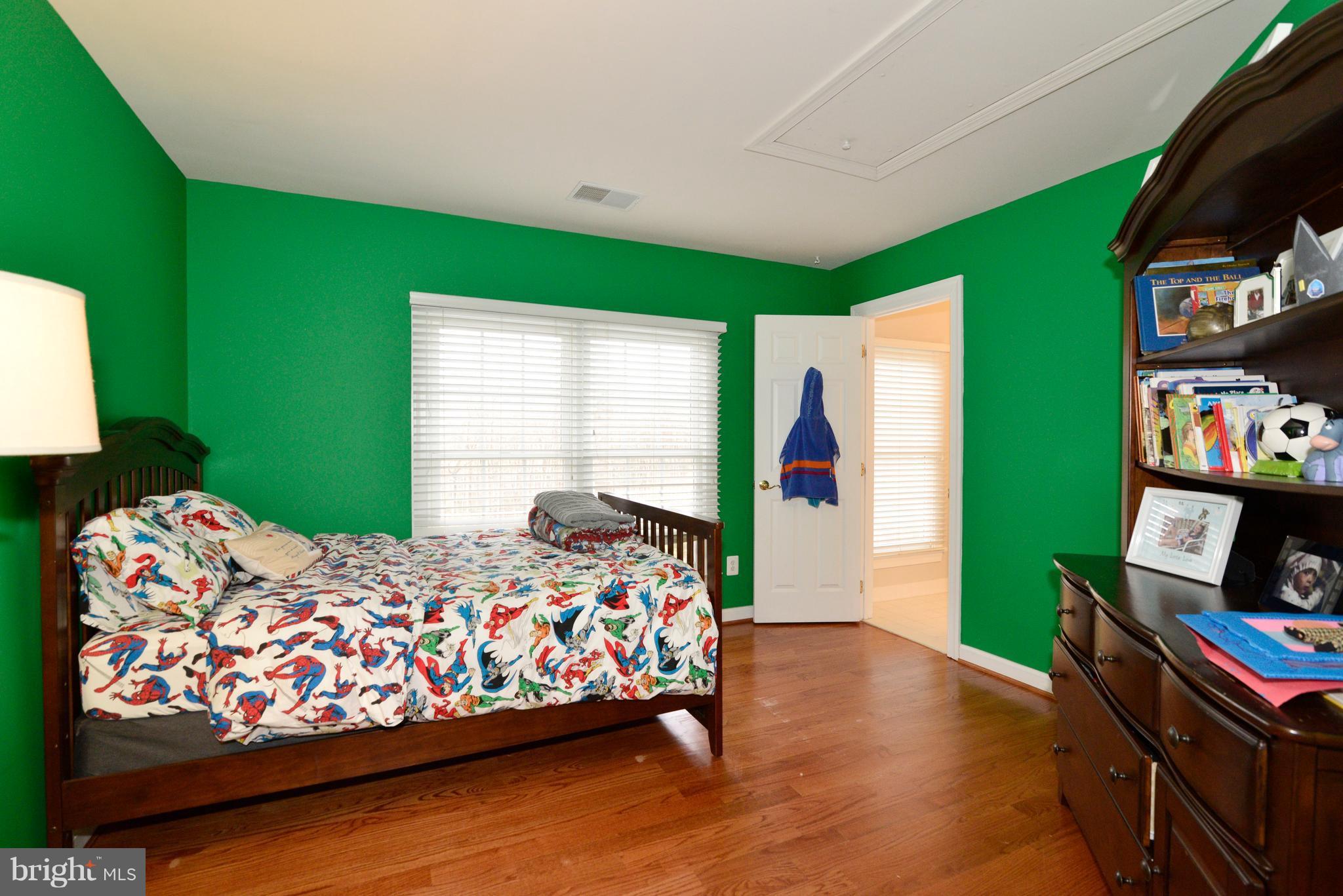 1763 Proffit Road Vienna, VA 22182 - Photo 8 of 30 a bedroom with bed and a window