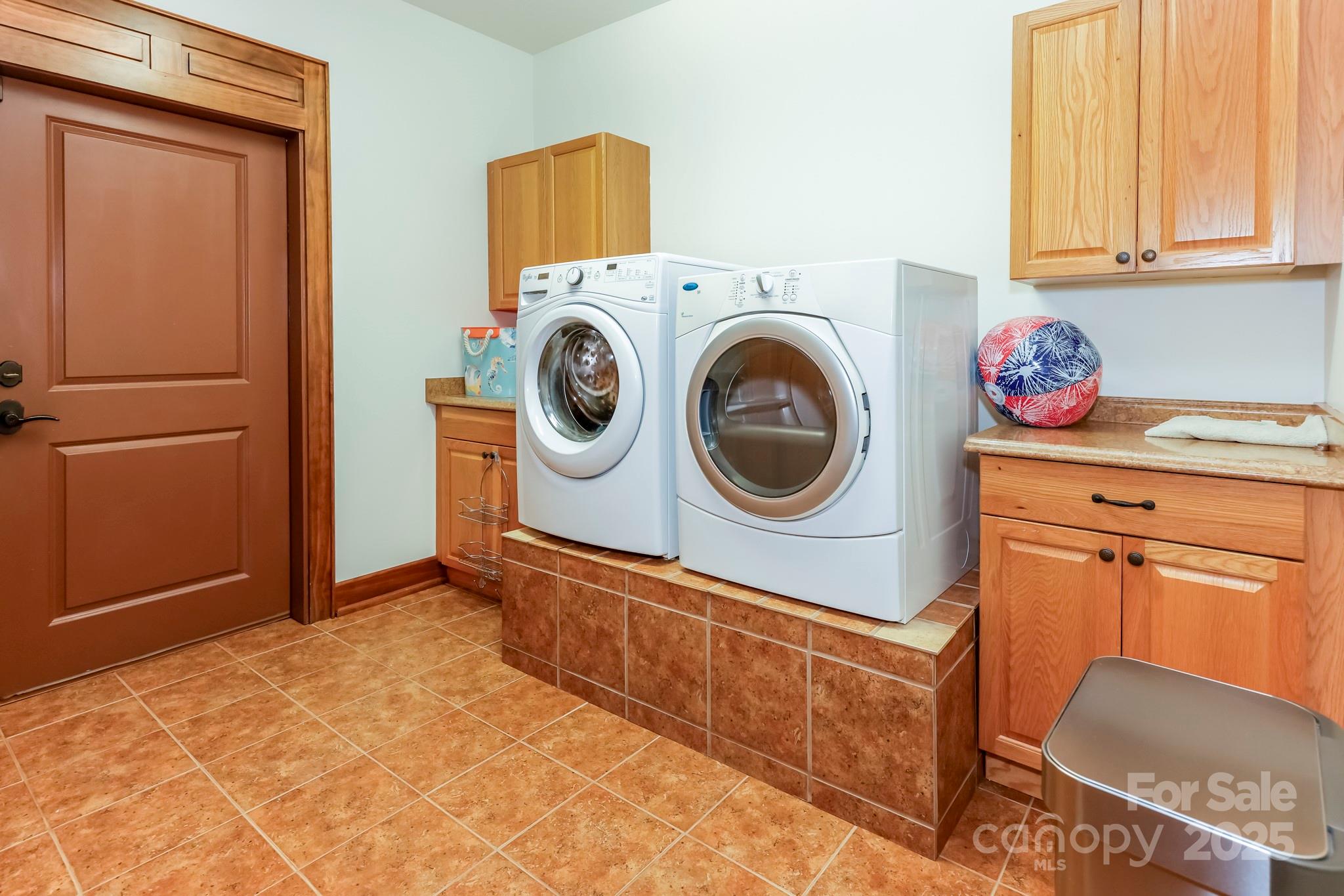 200 Chapel Point Road Lake Lure, NC 28746 - Photo 24 of 48 a utility room with dryer and washer