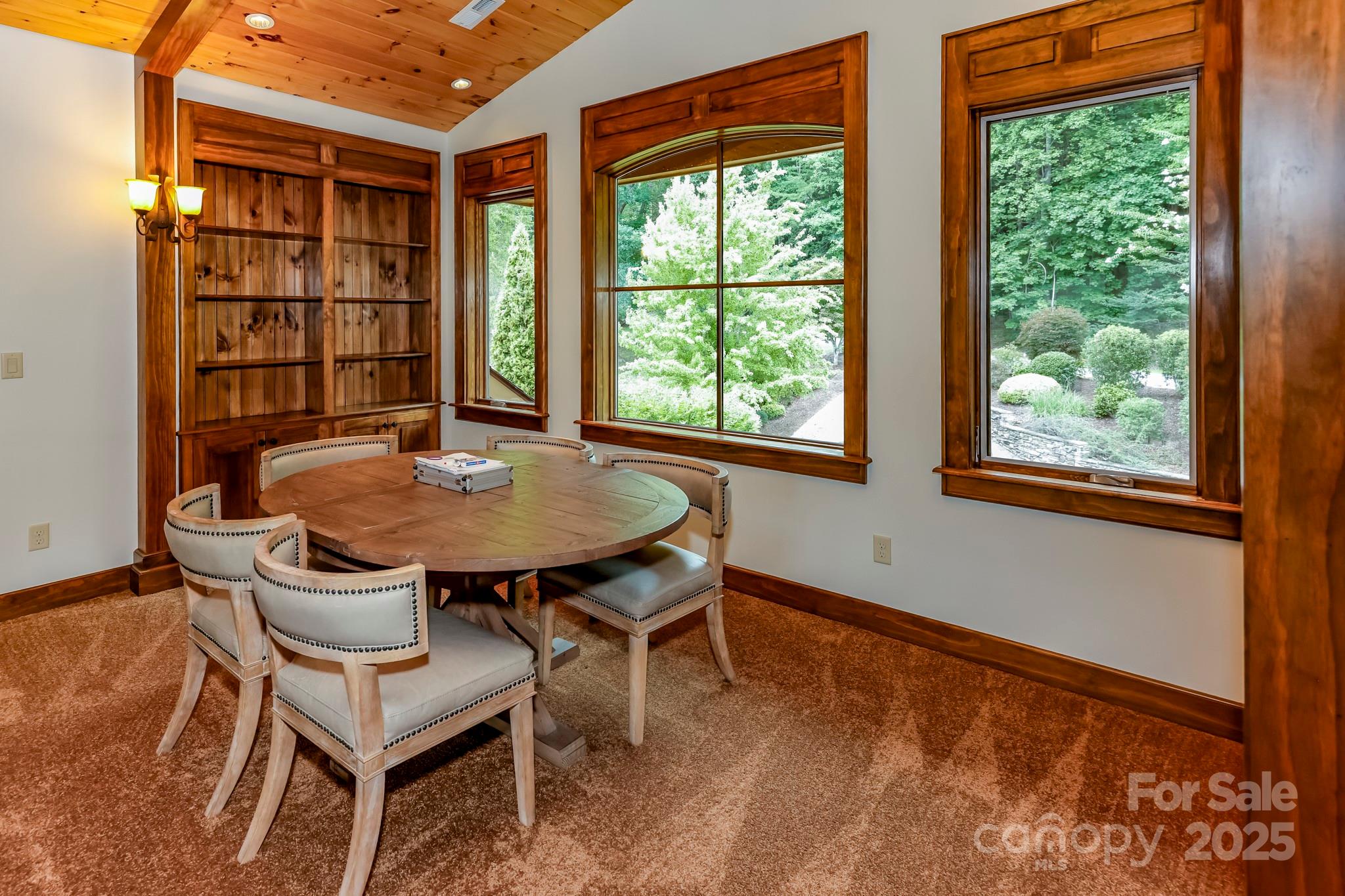 200 Chapel Point Road Lake Lure, NC 28746 - Photo 30 of 48 a dining room with furniture and window