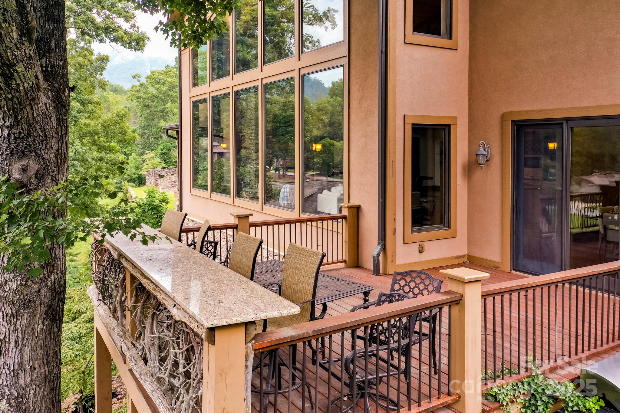 200 Chapel Point Road Lake Lure, NC 28746 - Photo 44 of 48 a view of a balcony with furniture