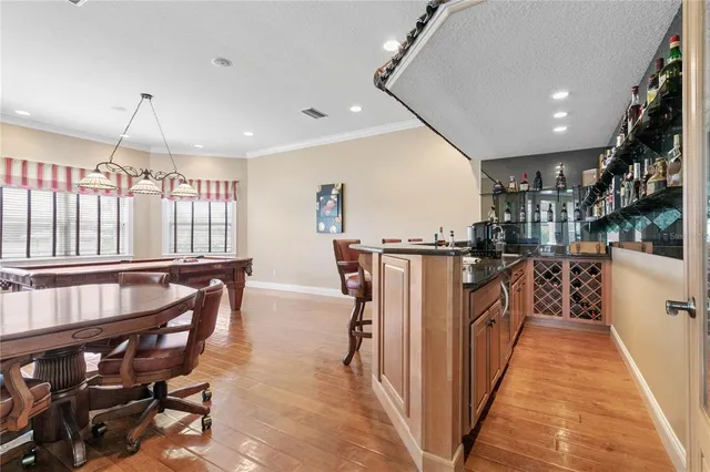 a bedroom with a large bed and a large window