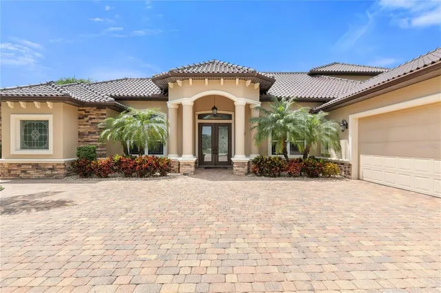 a view of a livingroom with furniture and a chandelier