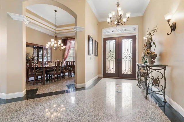 a view of a living room and dining room