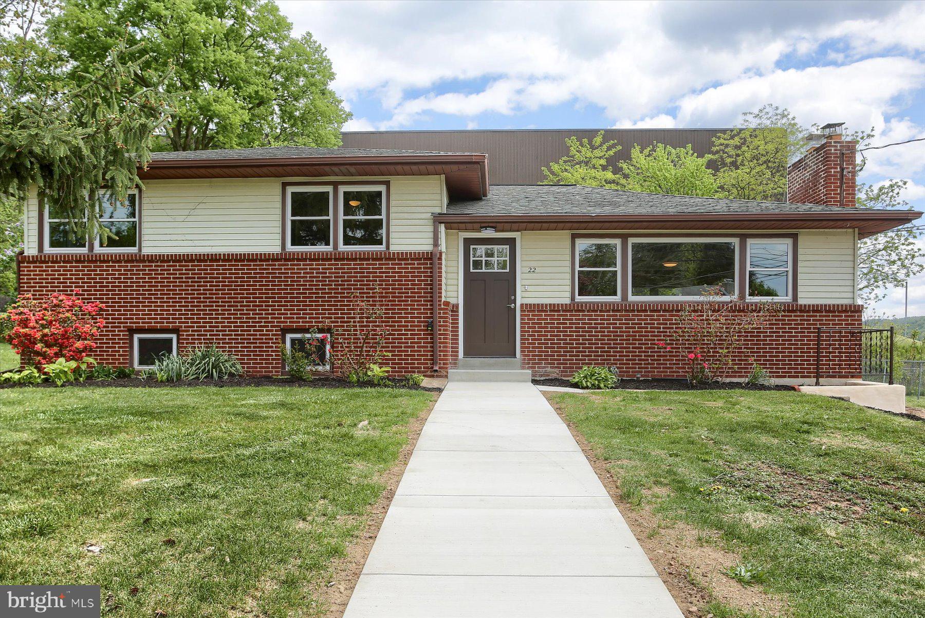 22 Boeing Road New Cumberland, PA 17070 - Photo 2 of 40 New concrete sidewalk to main floor.
