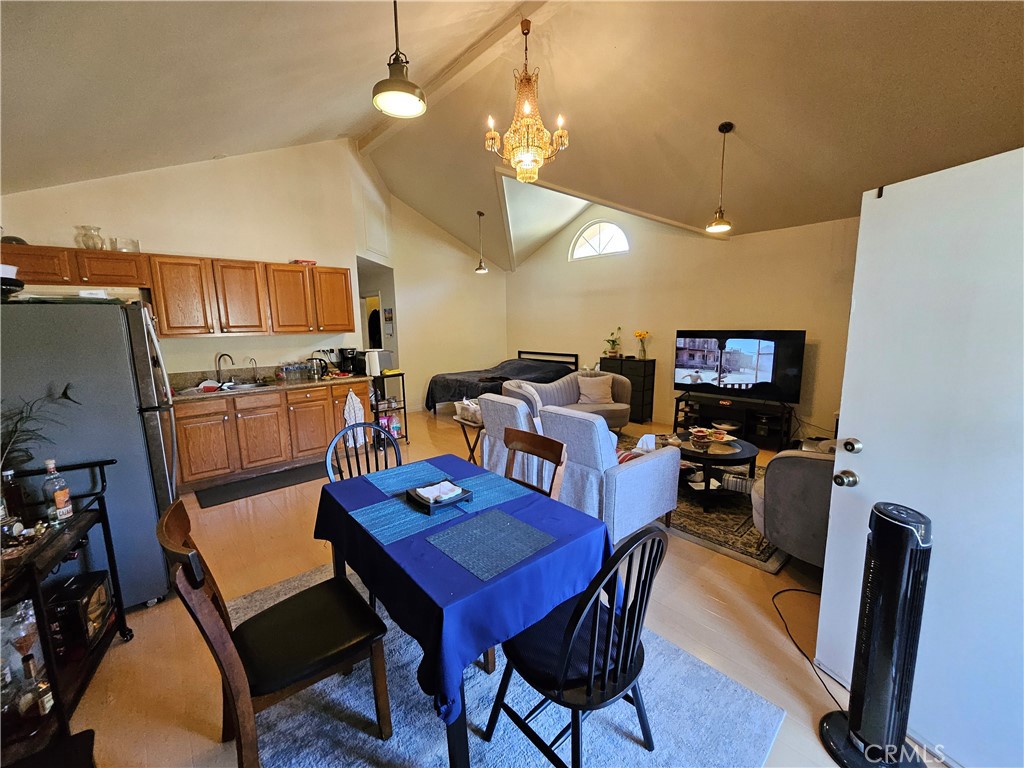 9740 La Canada Way Shadow Hills, CA 91040 - Photo 28 of 28 a view of a dining room with furniture