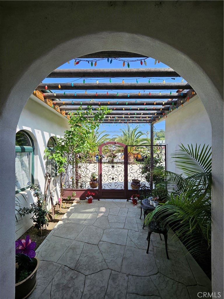 9740 La Canada Way Shadow Hills, CA 91040 - Photo 4 of 28 a living room with furniture and a large window