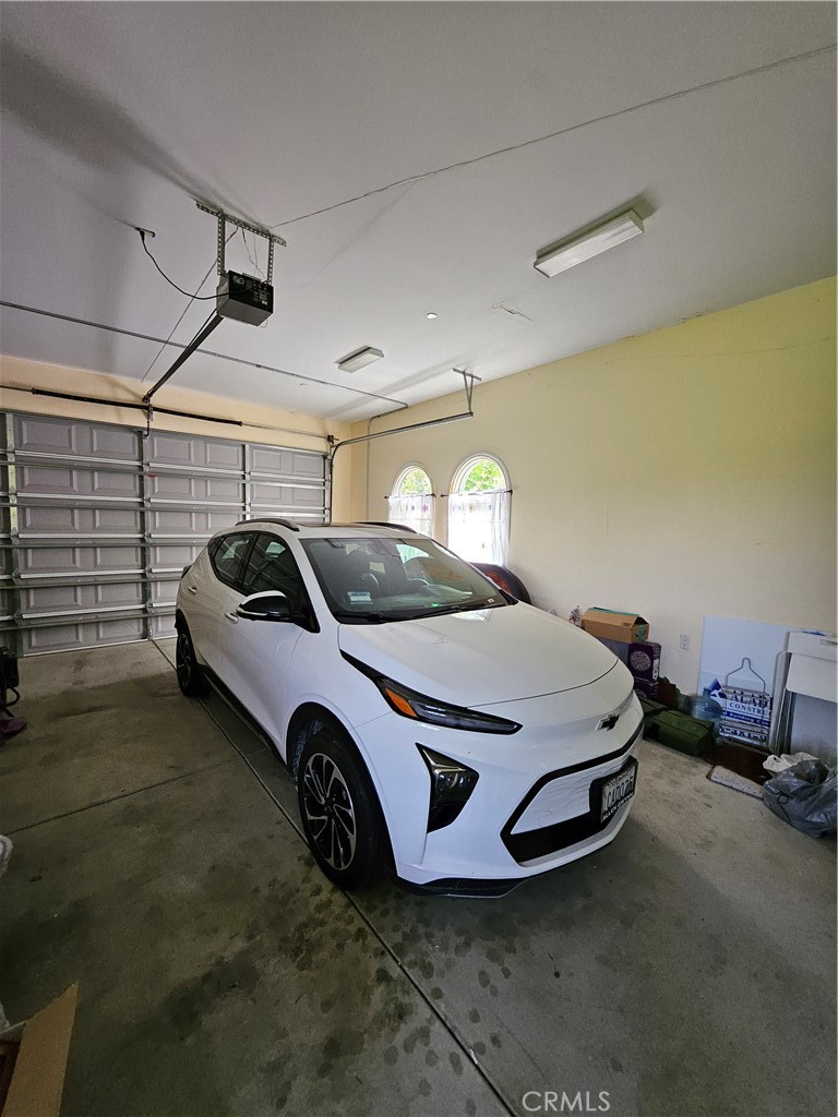 9740 La Canada Way Shadow Hills, CA 91040 - Photo 7 of 28 a car parked in a garage