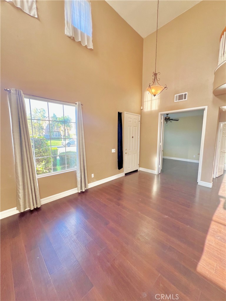 27145 Cherry Grove Court Temecula, CA 92591 - Photo 11 of 61 a view of a room with wooden floor and window