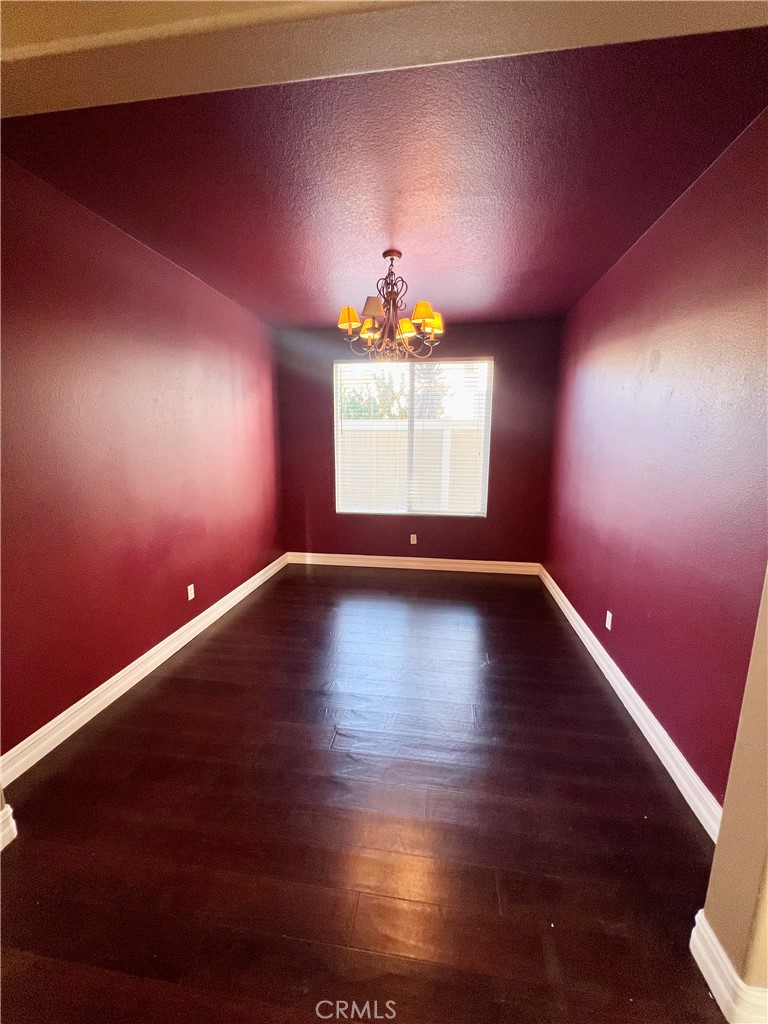 27145 Cherry Grove Court Temecula, CA 92591 - Photo 16 of 61 a view of wooden floor and windows in a room