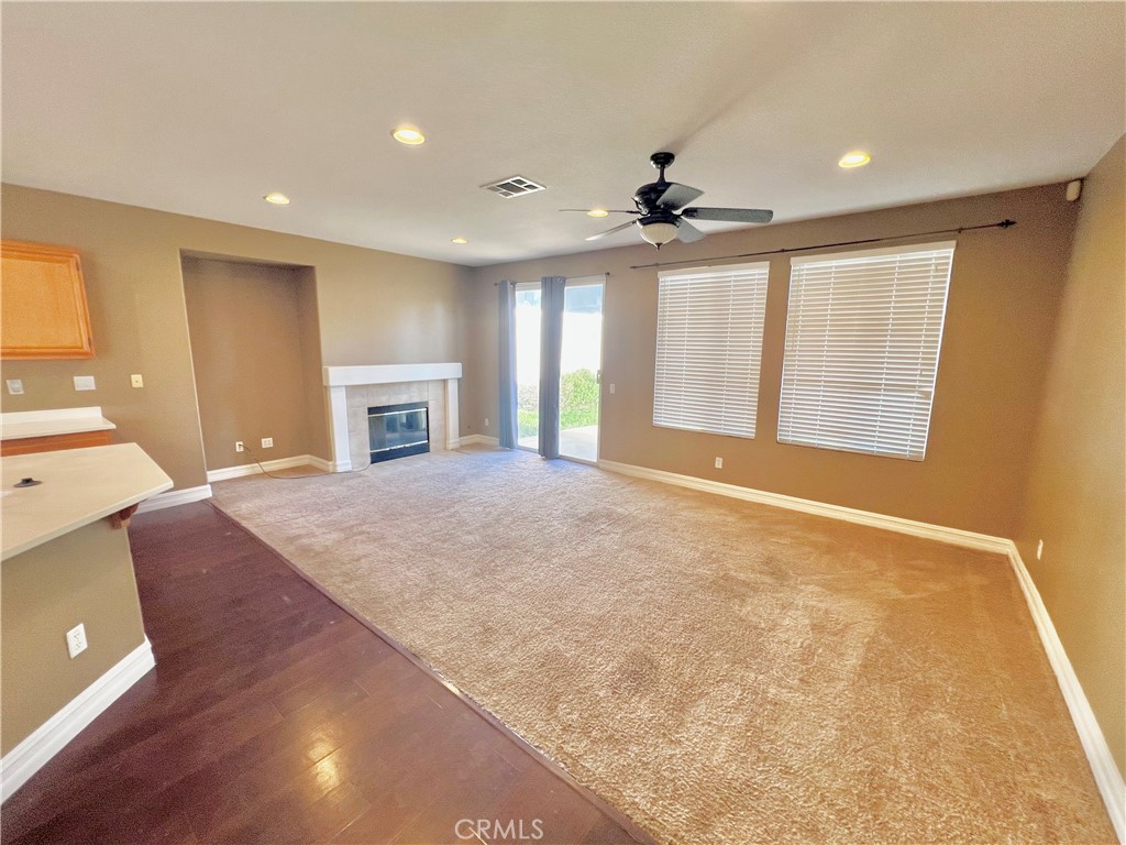 27145 Cherry Grove Court Temecula, CA 92591 - Photo 22 of 61 a view of an empty room with window and cabinet