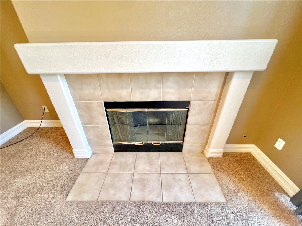 27145 Cherry Grove Court Temecula, CA 92591 - Photo 25 of 61 a living room with a rug and a rug