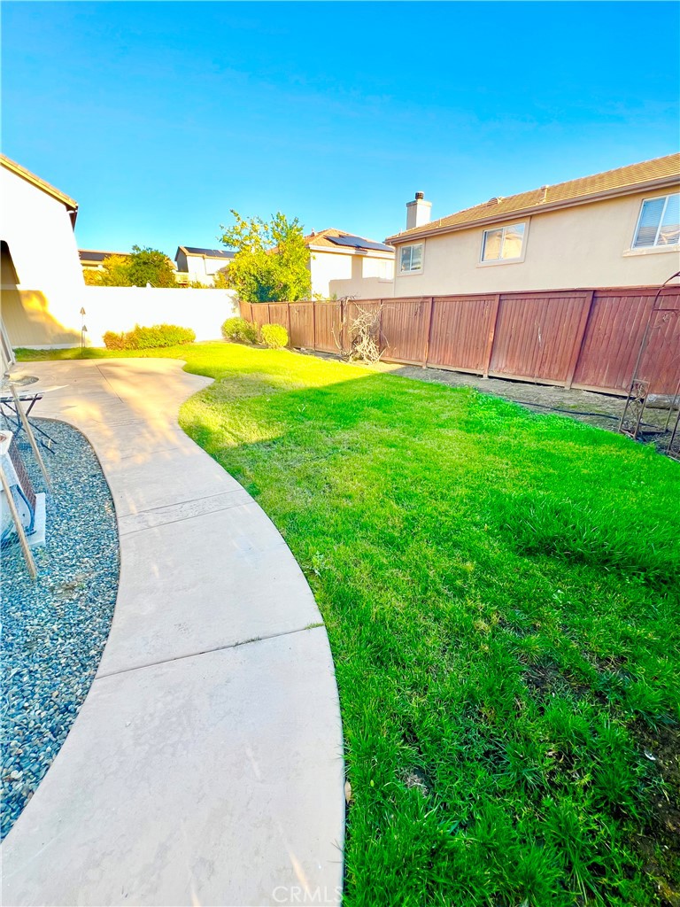 27145 Cherry Grove Court Temecula, CA 92591 - Photo 53 of 61 a view of a swimming pool with a yard