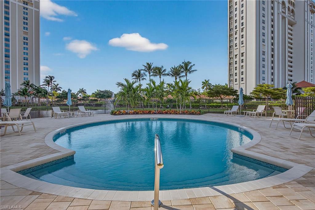 6537 Marissa Loop, Unit 4 Naples, FL 34108 - Photo 24 of 30 a view of outdoor space swimming pool and furniture