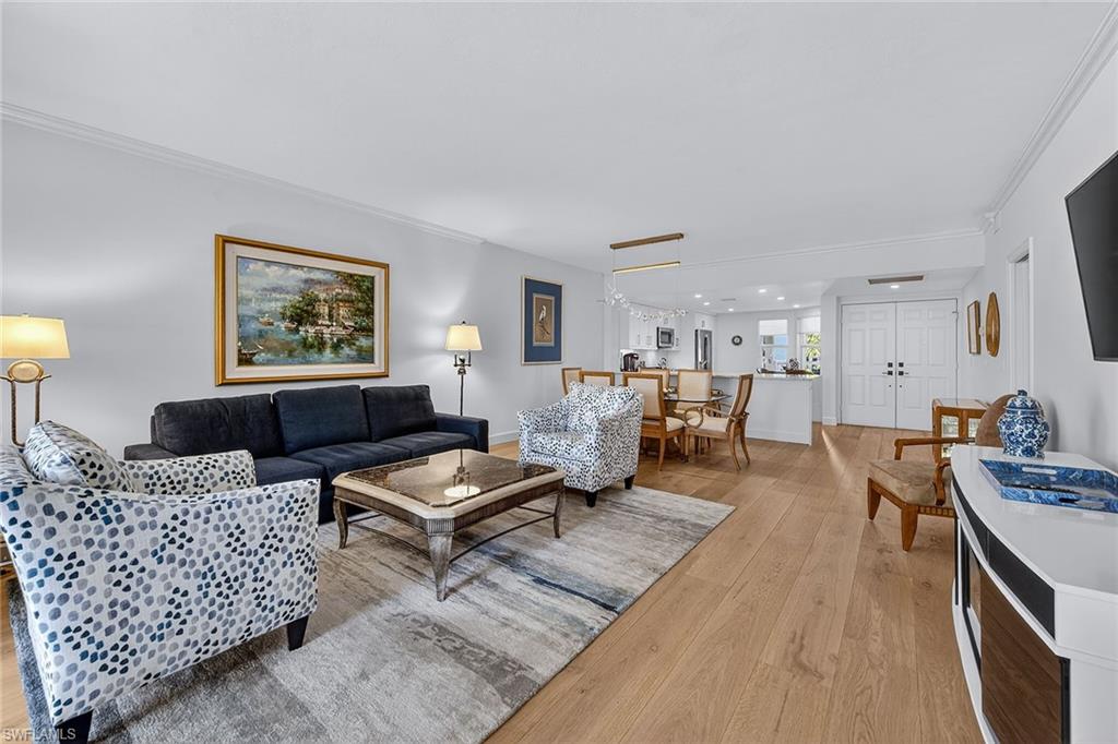 6537 Marissa Loop, Unit 4 Naples, FL 34108 - Photo 9 of 30 a living room with furniture and a couch