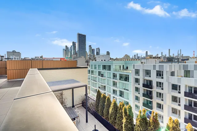 a view of a city from a balcony