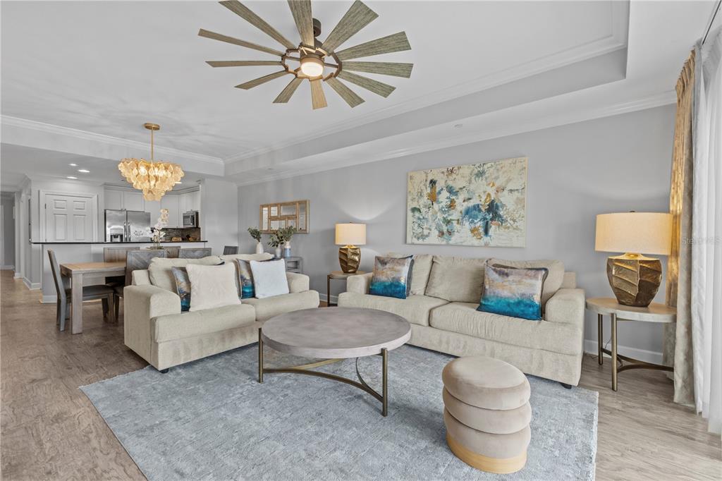 1354 Centre Ct Ridge Drive, Unit 302 Reunion, FL 34747 - Photo 2 of 33 a living room with furniture and a large window