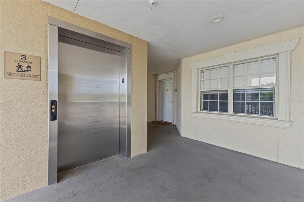 1354 Centre Ct Ridge Drive, Unit 302 Reunion, FL 34747 - Photo 31 of 33 an empty room with windows
